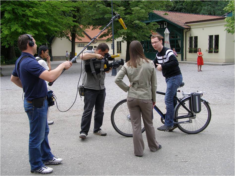 Photo: Media interviewing people about their experience